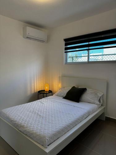 Postel nebo postele na pokoji v ubytování Punta Cana Summer retreat