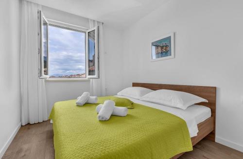 Ένα ή περισσότερα κρεβάτια σε δωμάτιο στο Kjara i Ivan