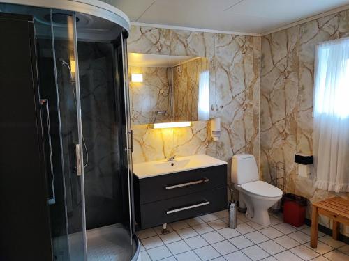 Un baño de Visit Undredal