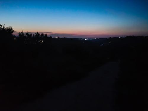 a view of the sunset from a field at La casetta sotto l'albero LA CAROVANA GITANA in Vasto