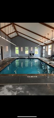 a large swimming pool in a large building at Sugar Ski & Country Club in Sugar Mountain