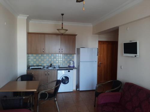 Η κουζίνα ή μικρή κουζίνα στο Saga Otel Apart