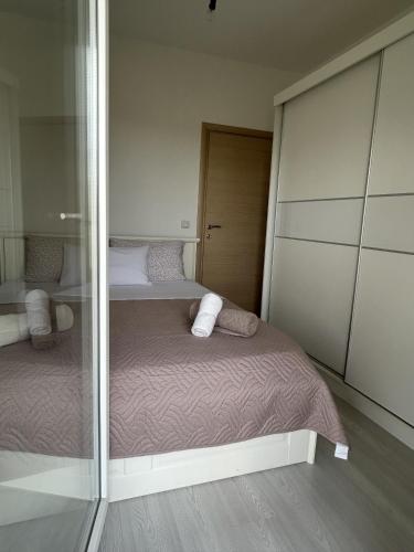 Ένα ή περισσότερα κρεβάτια σε δωμάτιο στο Apartman Marika