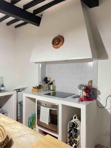 Η κουζίνα ή μικρή κουζίνα στο La casa di Carlotta