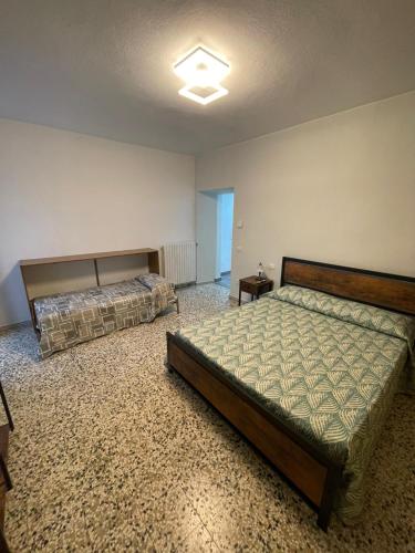 Postel nebo postele na pokoji v ubytování La Paulotta