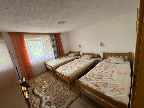 Postel nebo postele na pokoji v ubytování Apartman AMY