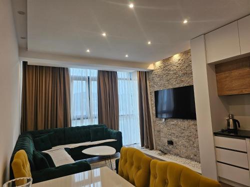 TV a/nebo společenská místnost v ubytování Moon Apartment