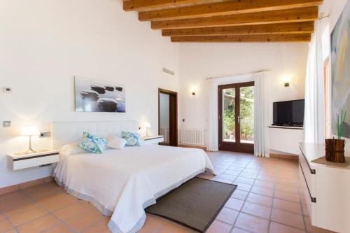 Ένα ή περισσότερα κρεβάτια σε δωμάτιο στο VILLA DEL MAR in Cala Deia