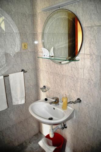 A bathroom at Apartments Lancek