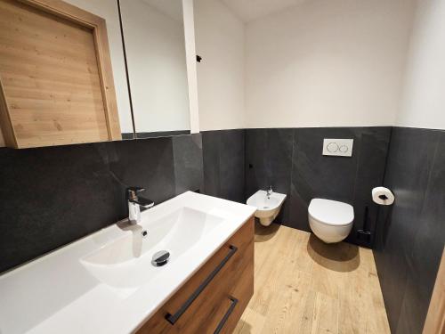 Bagno di Alpine Lodge Tesero - Alpine Stay Apartments