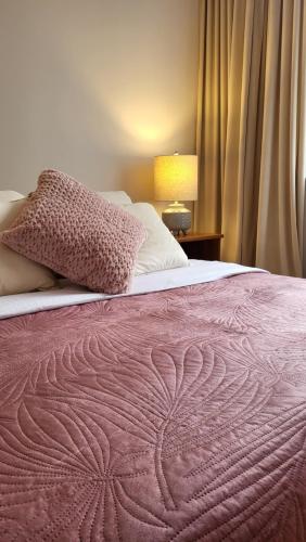Katil atau katil-katil dalam bilik di Apartament Camelia