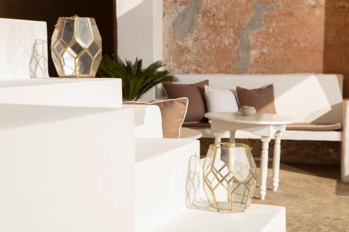 a living room with a couch and a table at Don Alfonso Dimora D'epoca in Racale