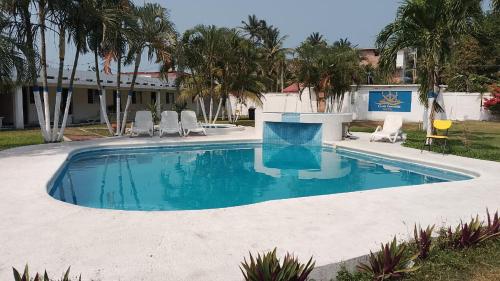Bazén v ubytování Hotel Costa Esmeralda nebo v jeho okolí