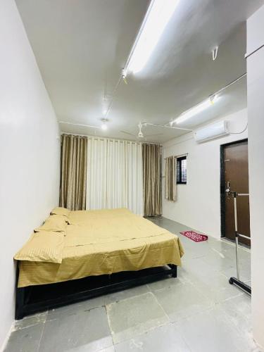 Katil atau katil-katil dalam bilik di Maheshwari Bhakt Niwas And Homestay