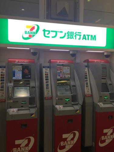 a row of atm machines in a gas station at Kyobashi Osaka Castle 8 Guests Large Free Parking Little Planet in Osaka