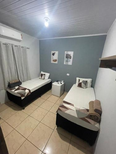 Ένα ή περισσότερα κρεβάτια σε δωμάτιο στο Hotel Stillus