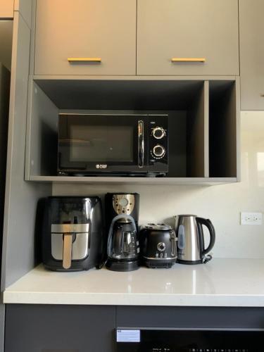 Kuchyň nebo kuchyňský kout v ubytování Grand Haven JA- 2 bedroom