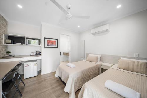 Kuchyň nebo kuchyňský kout v ubytování Verandah Motel