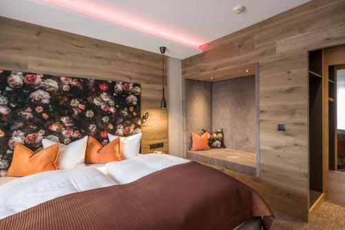 Hotel Jägerhof Mayrhofenにあるベッド