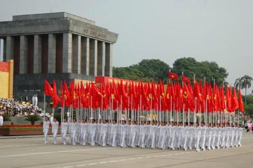 a group of people in red and white uniforms at Lux Apartment Ngọc Khánh 2 in Hanoi