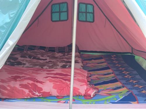 Ένα ή περισσότερα κρεβάτια σε δωμάτιο στο Holiday camp