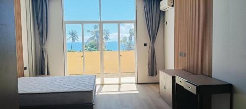 Krevet ili kreveti u jedinici u okviru objekta Grace Hotel