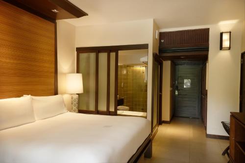 Postel nebo postele na pokoji v ubytování Siam Bayshore Resort Pattaya