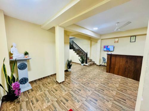 an empty lobby with a staircase and a stair case at The Regent Hotel in Colombo