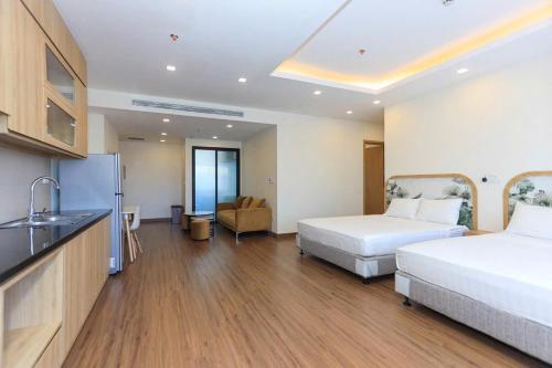 Katil atau katil-katil dalam bilik di FLC Sea Tower Quy Nhơn - Căn hộ view biển