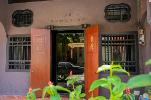 an entrance to a building with an open door at 88 Armenian in George Town