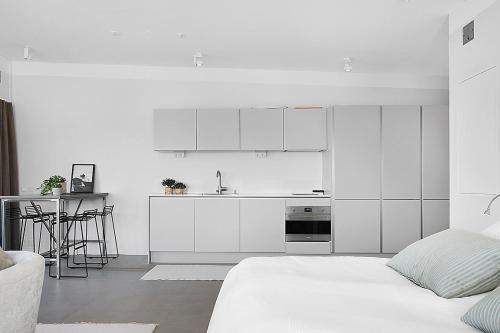 Dapur atau dapur kecil di Hotell Kungshamn Suites