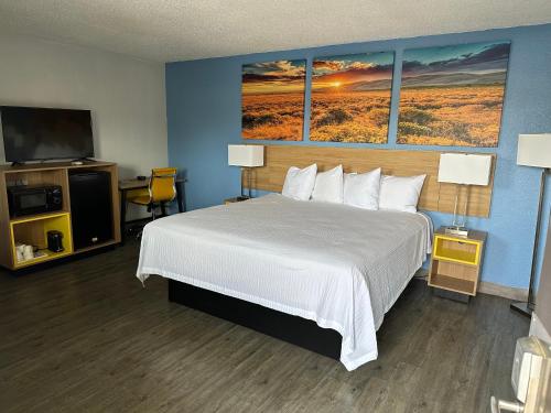 Ένα ή περισσότερα κρεβάτια σε δωμάτιο στο Days Inn by Wyndham Gatesville