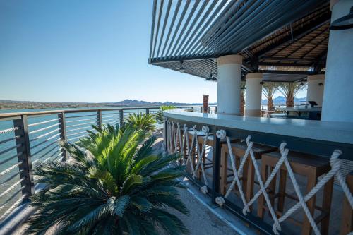 a resort balcony with a view of the ocean at The Nautical Beachfront Resort in Lake Havasu City