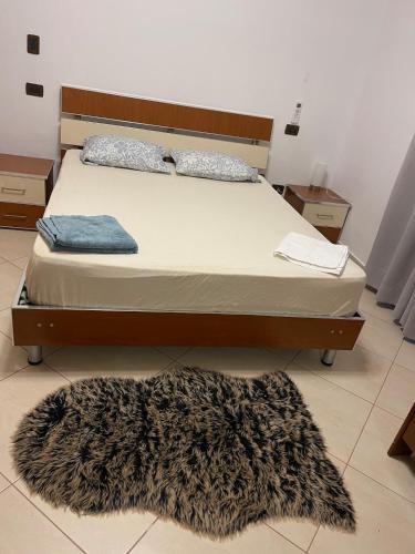 Llit o llits en una habitació de Villa Sindy B&B