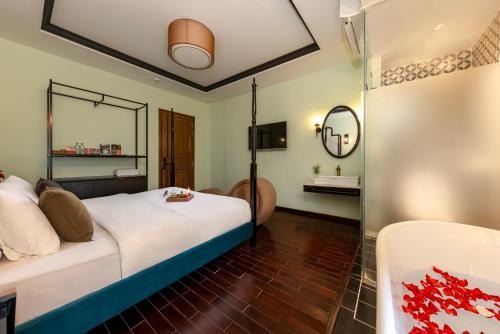 Katil atau katil-katil dalam bilik di Secret Gar-den Hotel Phan Huy Ich