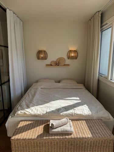 Ένα ή περισσότερα κρεβάτια σε δωμάτιο στο Seabreeze City Studio