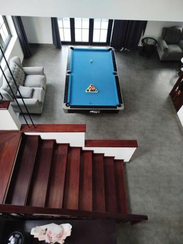 a view of a living room with a pool table at Tony Villa Homestay Ba Vì in Ba Vì
