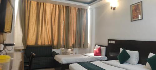 Postel nebo postele na pokoji v ubytování Hotel Fringo