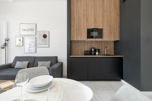 Η κουζίνα ή μικρή κουζίνα στο Shellter Apartments 117 Ł - by Jantar Apartamenty