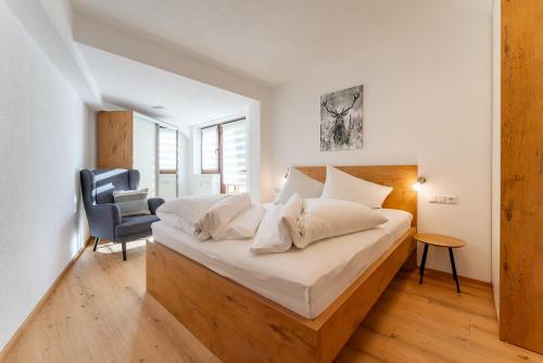 Postel nebo postele na pokoji v ubytování Villa Oberbichl