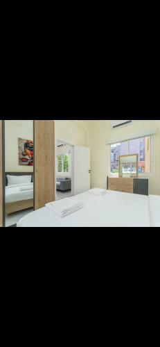 Tempat tidur dalam kamar di Porto gio2