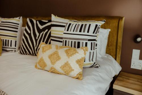 Katil atau katil-katil dalam bilik di Out of Africa Town Lodge