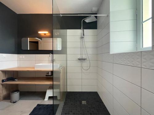 a bathroom with a shower and a sink at Prat in Livron