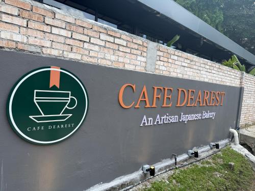 a sign for a care deficit car garage at Agile TRX Luxury suite Bukit bintang in Kuala Lumpur
