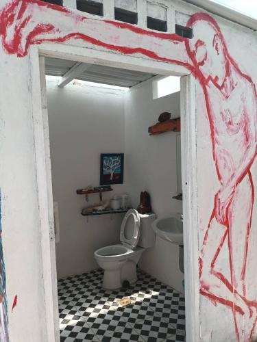 a bathroom with a toilet and a sink at Beach Front Villa, Saphli beach, Chumphon,Thailand in Ban Tha Samet (1)