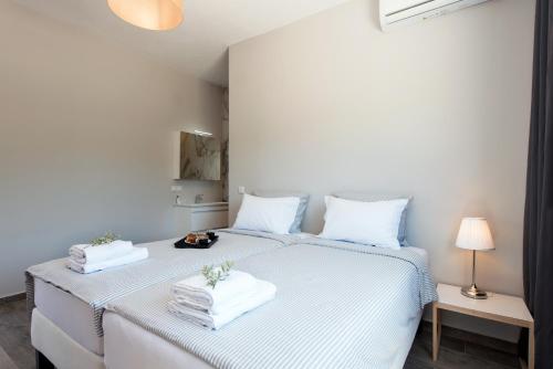 Katil atau katil-katil dalam bilik di Endless Summer Retreats By Paradise Villas