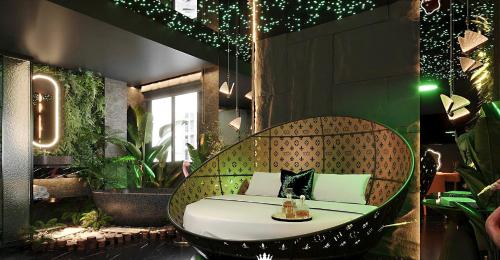 a room with a bench with plants and lights at Ngan Le Mot Dem Hotel - Khach San 1001 Unique Love Hotel in Ho Chi Minh City