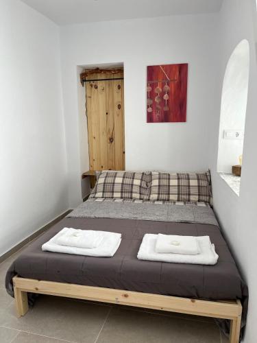 Ένα ή περισσότερα κρεβάτια σε δωμάτιο στο Casa Ferroli
