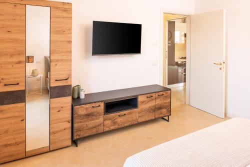Giada Apartmentsにあるテレビまたはエンターテインメントセンター