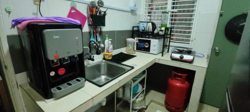 Η κουζίνα ή μικρή κουζίνα στο Ian's Homestay Tanah Rata C Highlands